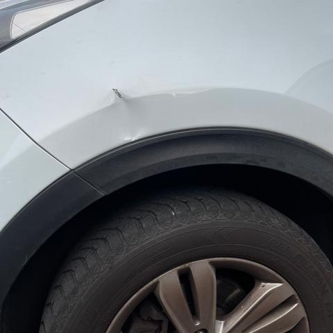 Kia Sportage Wing Dent Repair - Before